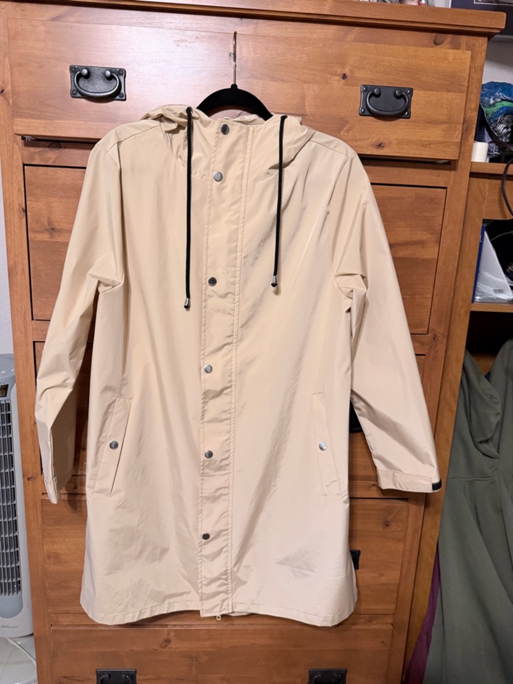 Amazon Cream Hooded Rain jacket with Black Drawstrings
